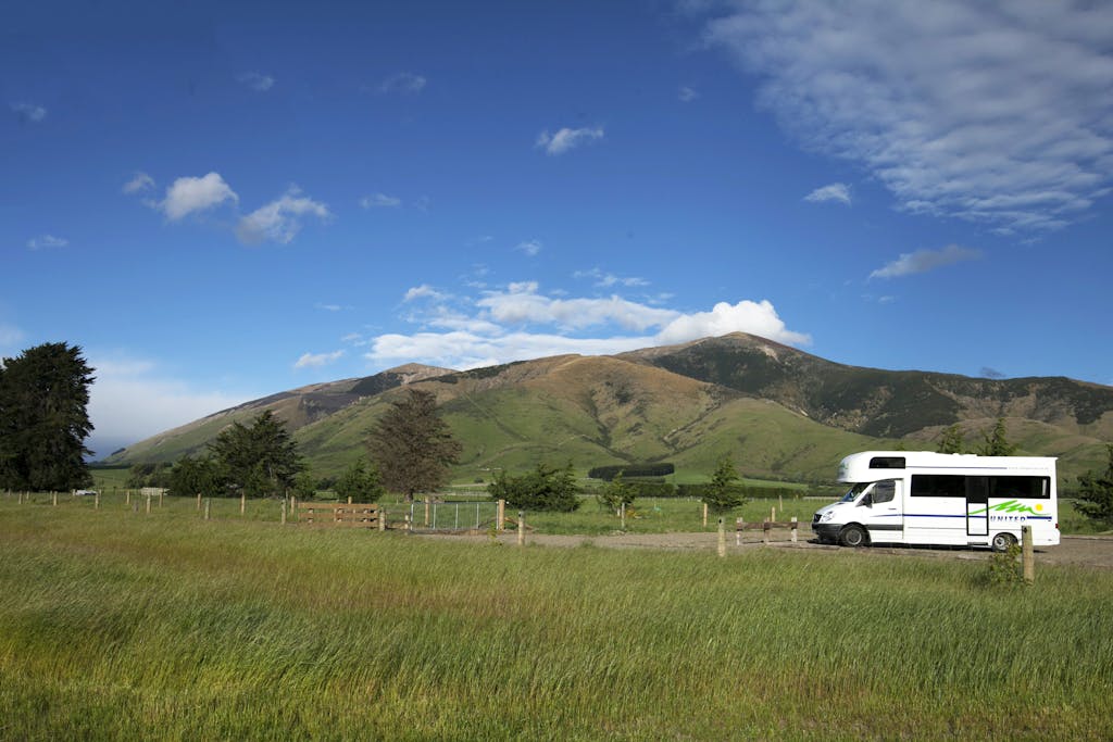 Motorhome in the Parking Lot of a RV Site in the Mountains